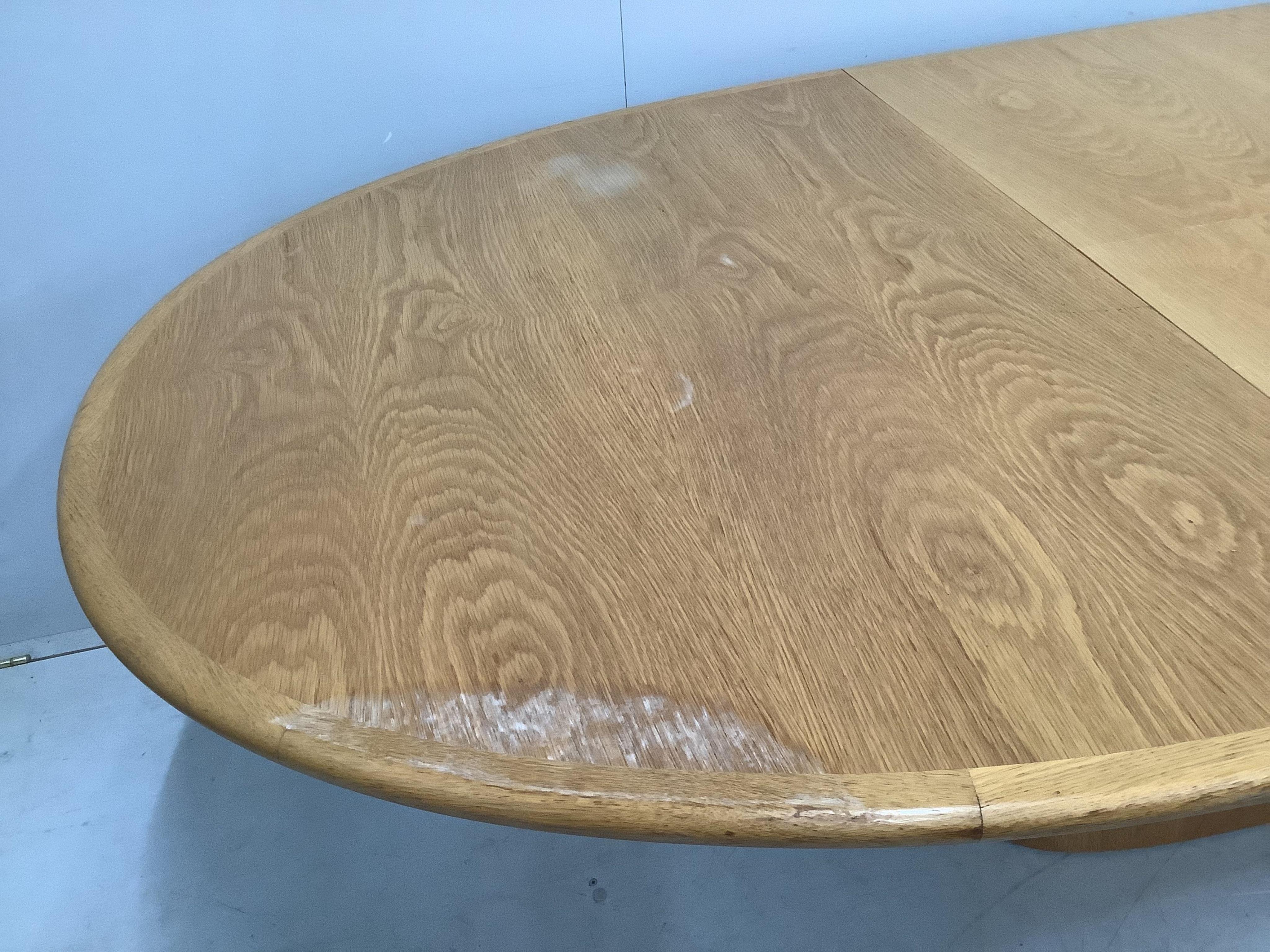 A Skovby oak extending dining table, 250cm extended, depth 108cm, height 72cm